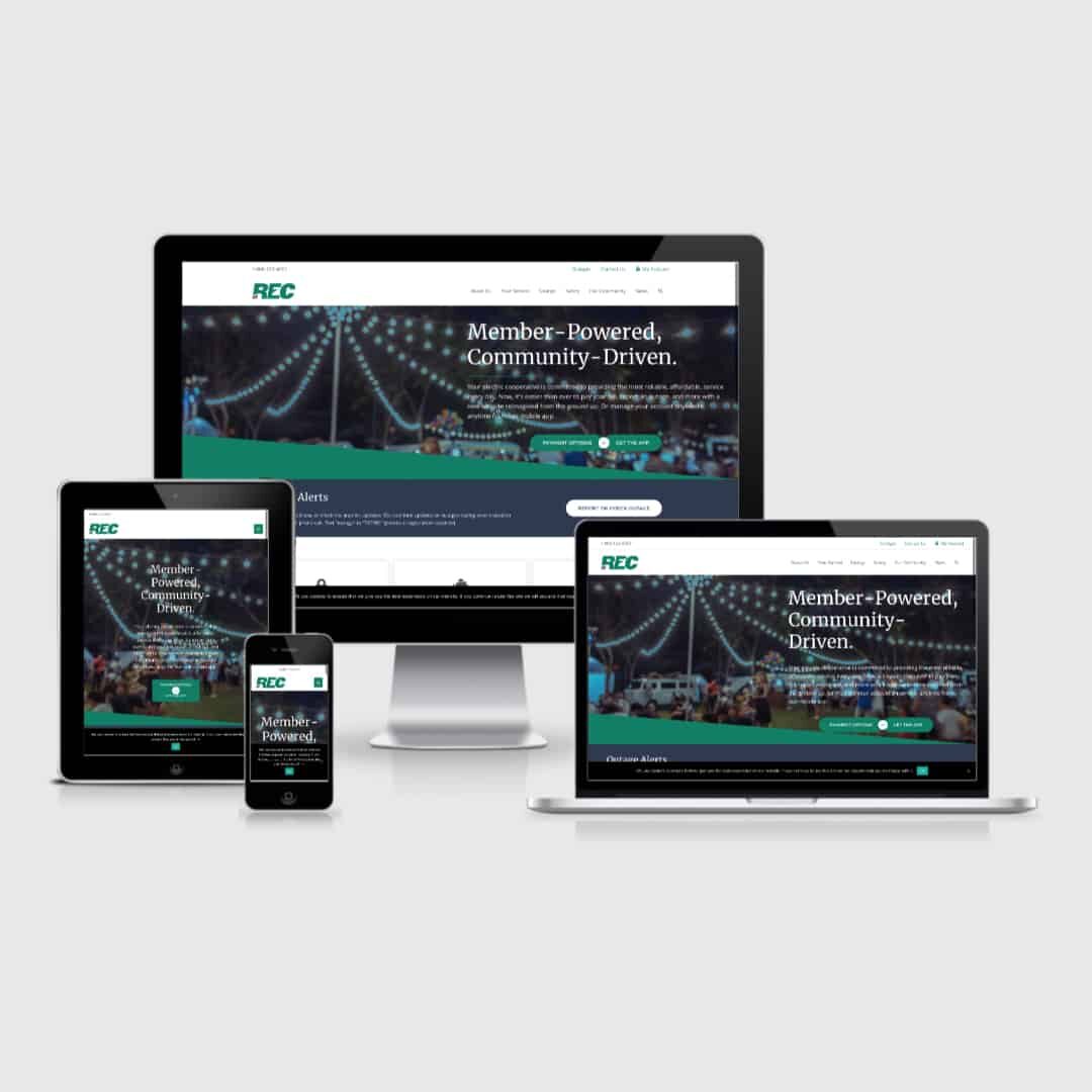 Mobile-friendly electric cooperative web design as displayed on multiple devices